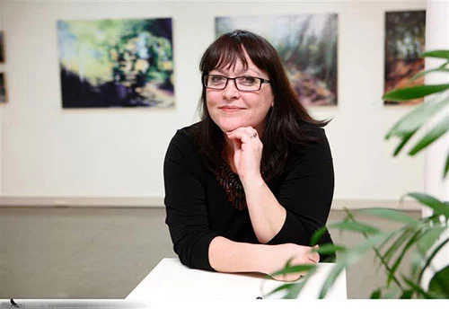 Image of Amanda van Gils at her In Between Places exhibition at Hervey Bay Regional Gallery