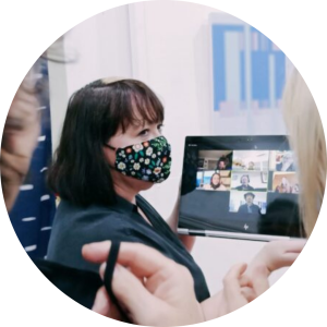 group coaching meeting at gallery exhibition