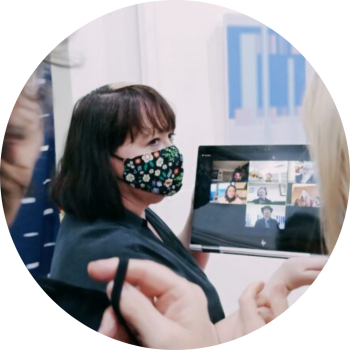 group coaching meeting at gallery exhibition